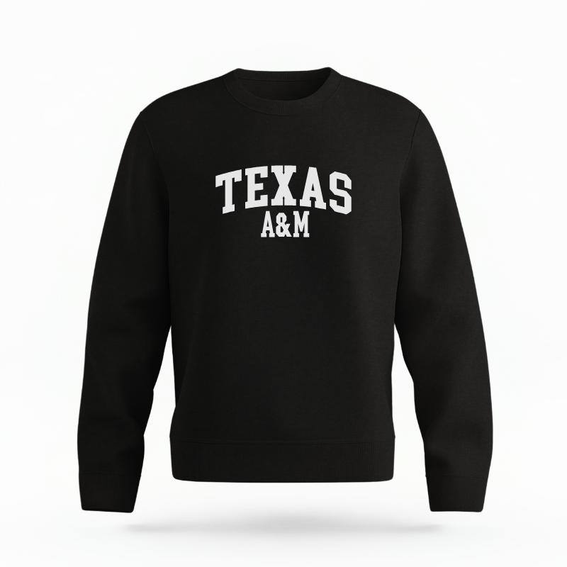 The Black Unisex Texas A&M Varsity Organic Cotton Crewneck is set against a Ghost - White Studio background. The Texas A&M Varsity graphic is in a Sports Graphics style.