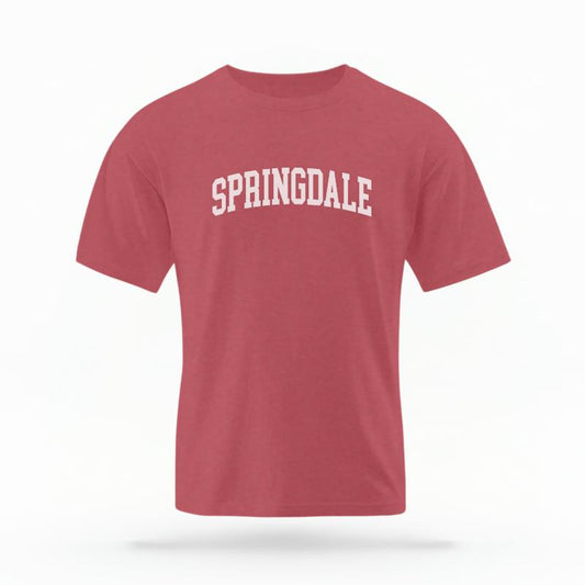 The Crimson Unisex Springdale AR Varsity T-shirt is set against a Ghost - White Studio background. The Springdale AR Varsity graphic is in a Varsity style.
