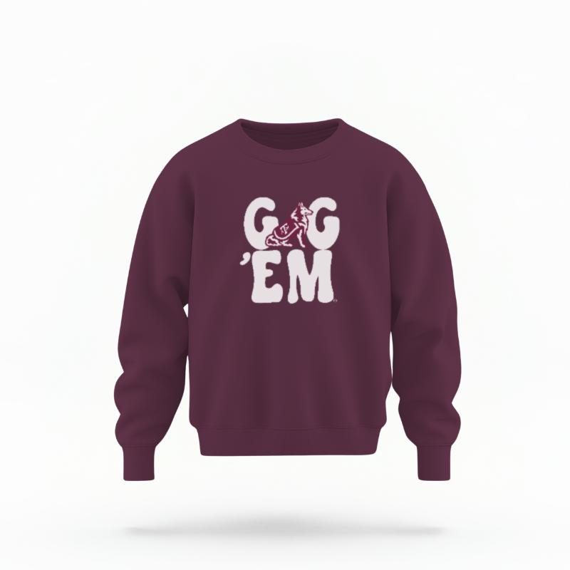The Maroon Unisex Gig 'Em Retro Reveille Youth Crewneck Sweatshirt is set against a Ghost - White Studio background. The Gig 'Em Retro Reveille graphic is in a Sports Graphics style.