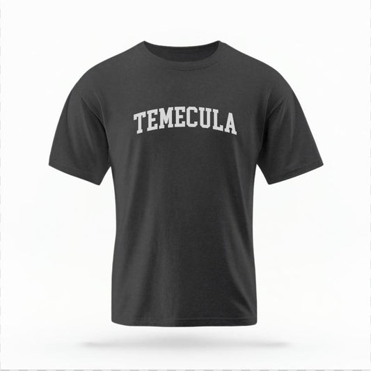 The Pepper Unisex Temecula CA Varsity T-shirt is set against a Ghost - White Studio background. The Temecula CA Varsity graphic is in a Varsity style.