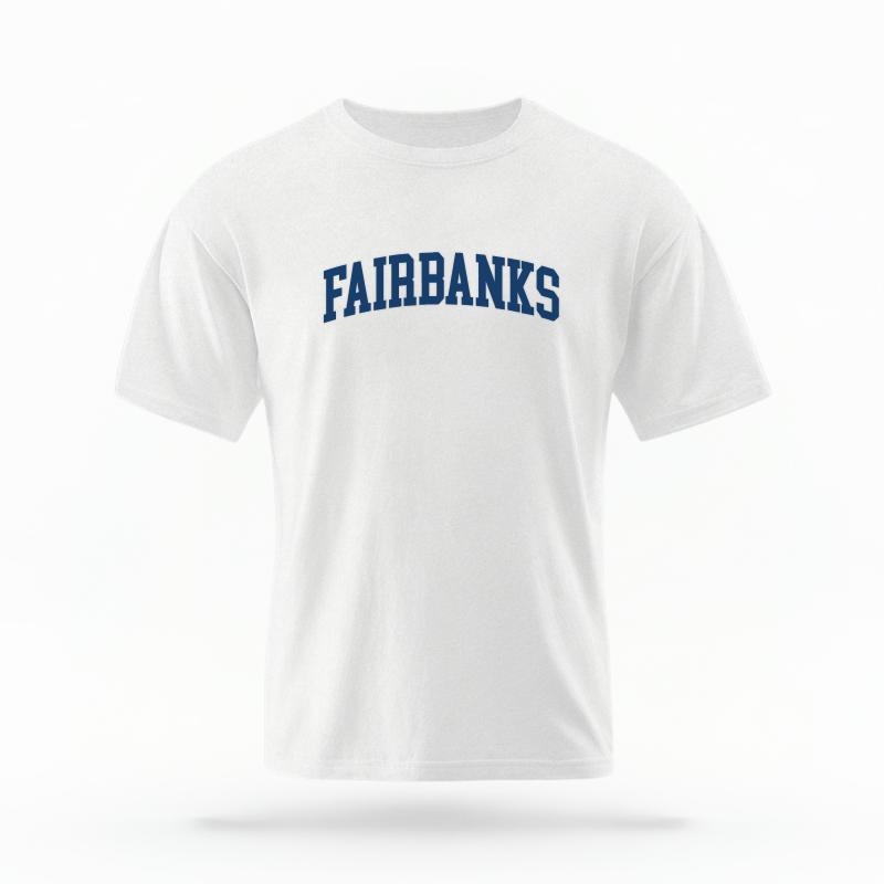 The White Unisex Fairbanks Alaska Varsity T-shirt is set against a Ghost - White Studio background. The Fairbanks Alaska Varsity graphic is in a Varsity style.