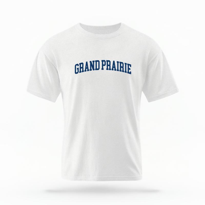 The White Unisex Grand Prairie Texas T-shirt is set against a Ghost - White Studio background. The Grand Prairie Texas graphic is in a Varsity style.