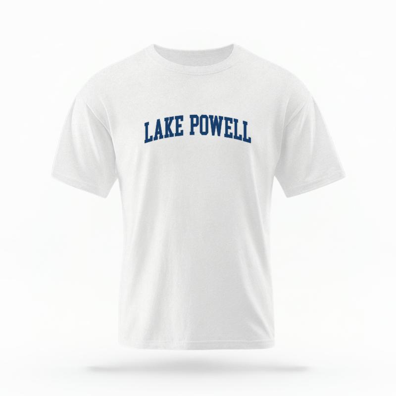 The White Unisex Lake Powell AZ Varsity T-shirt is set against a Ghost - White Studio background. The Lake Powell AZ Varsity graphic is in a Varsity style.