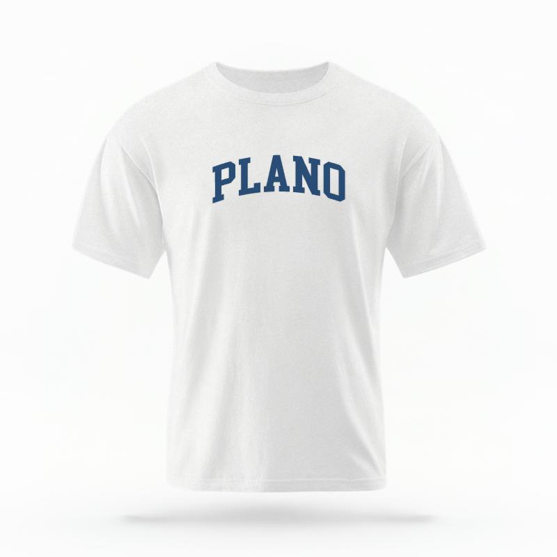 The White Unisex Plano Texas Varsity T-shirt is set against a Ghost - White Studio background. The Plano Texas Varsity graphic is in a Varsity style.