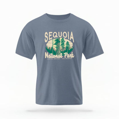 The Blue Jean Unisex Sequoia National Park T-shirt is set against a Ghost - White Studio background.  The Sequoia National Park graphic is in a National Parks style. 