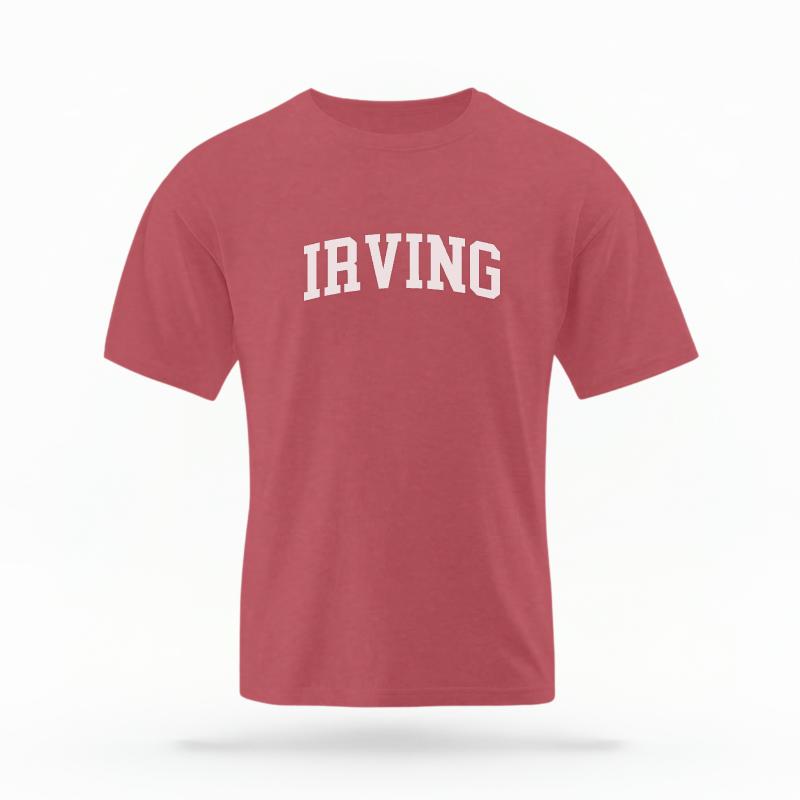 The Crimson Unisex Irving Varsity T-shirt is set against a Ghost - White Studio background.  The Irving Varsity graphic is in a Varsity style. 