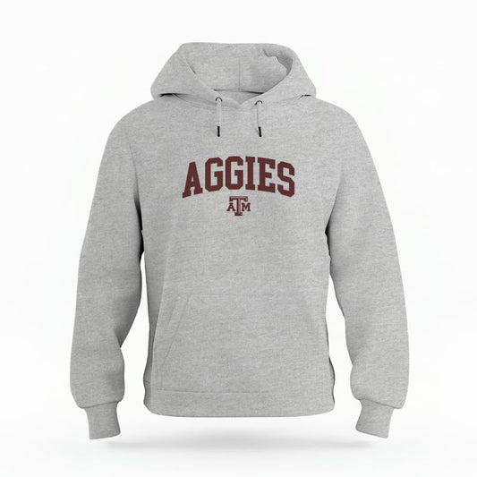 The Heather Grey Unisex Aggies Varsity Organic Cotton Hoodie is set against a Ghost - White Studio background.  The Aggies Varsity graphic is in a Sports Graphics style. 