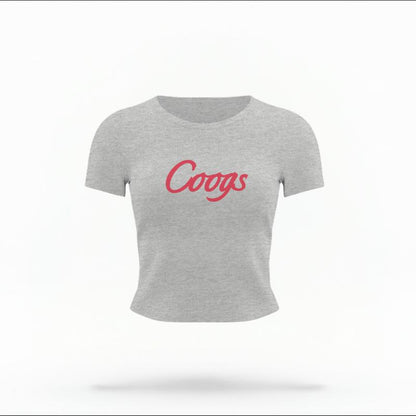 The Heather Grey Female Coogs Script Women's Baby Tee is set against a Ghost - White Studio background.  The Coogs Script graphic is in a Sports Graphics style. 