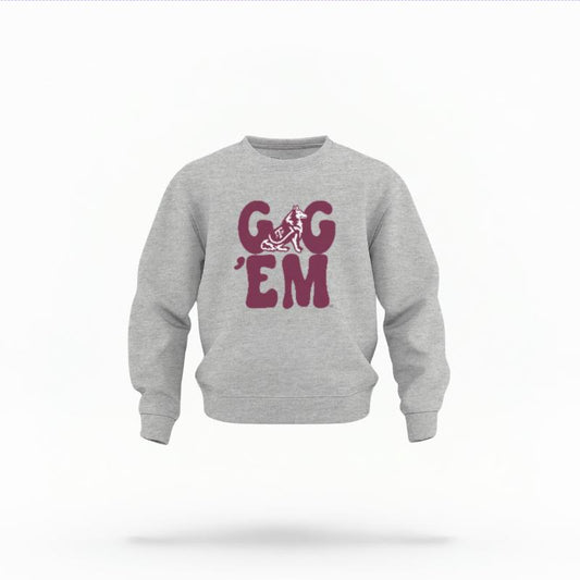 The Heather Grey Unisex Gig 'Em Retro Reveille Toddler Crewneck is set against a Ghost - White Studio background.  The Gig 'Em Retro Reveille graphic is in a Sports Graphics style. 