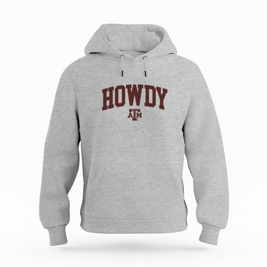 The Heather Grey Unisex Howdy Varsity Organic Cotton Hoodie is set against a Ghost - White Studio background.  The Howdy Varsity graphic is in a Sports Graphics style. 