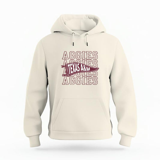The Ivory Unisex Aggies Pennant Organic Cotton Hoodie is set against a Ghost - White Studio background.  The Aggies Pennant graphic is in a Sports Graphics style. 