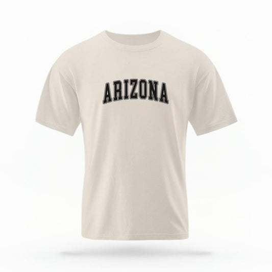 The Ivory Unisex Arizona Varsity T-shirt is set against a Ghost - White Studio background.  The Arizona Varsity graphic is in a Varsity style. 