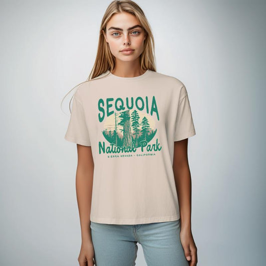 The Ivory Unisex Sequoia National Park T-shirt is set against a Model - White Studio background.  The Sequoia National Park graphic is in a National Parks style. 