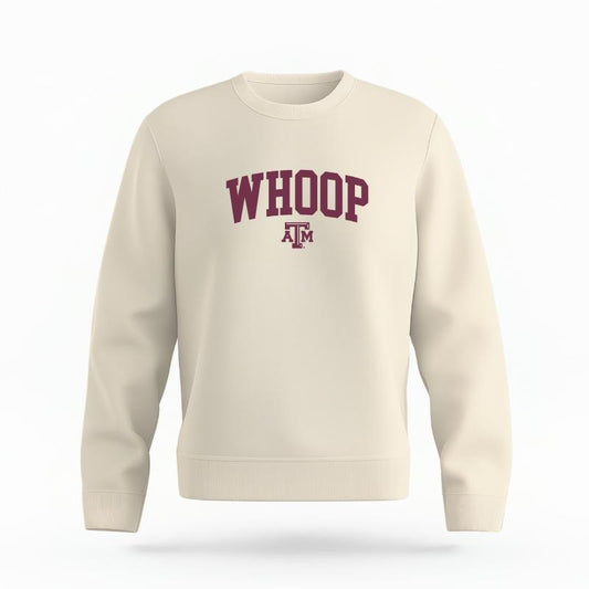 The Ivory Unisex Whoop Varsity Organic Cotton Crewneck is set against a Ghost - White Studio background.  The Whoop Varsity graphic is in a Sports Graphics style. 