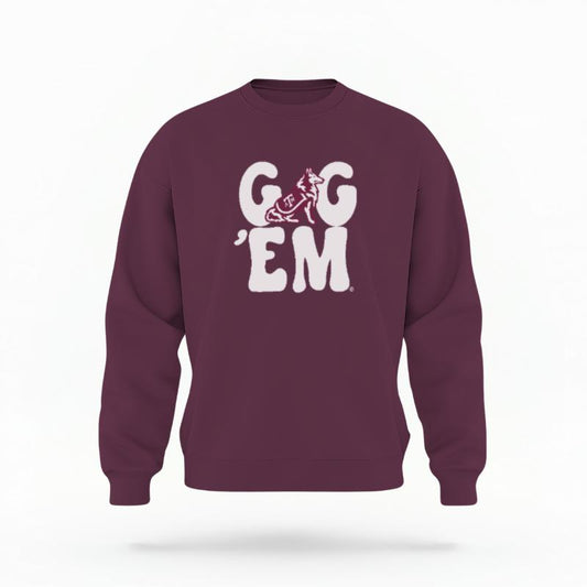 The Maroon Unisex Gig 'Em Retro Reveille Crewneck Sweatshirt is set against a Ghost - White Studio background.  The Gig 'Em Retro Reveille graphic is in a Sports Graphics style. 