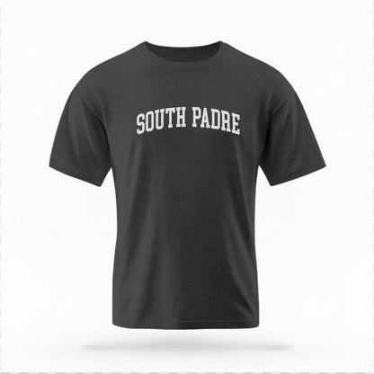The Pepper Unisex South Padre Varsity T-shirt is set against a Ghost - White Studio background.  The South Padre Varsity graphic is in a Varsity style. 