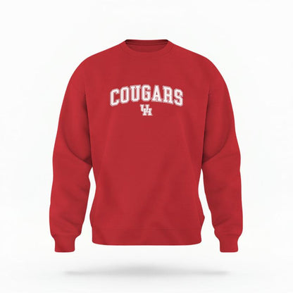 The Red Unisex Cougars Varsity Crewneck Sweatshirt is set against a Ghost - White Studio background.  The Cougars Varsity graphic is in a Varsity style. 