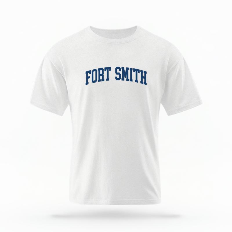 The White Unisex Fort Smith AR Varsity T-shirt is set against a Ghost - White Studio background.  The Fort Smith AR Varsity graphic is in a Varsity style. 
