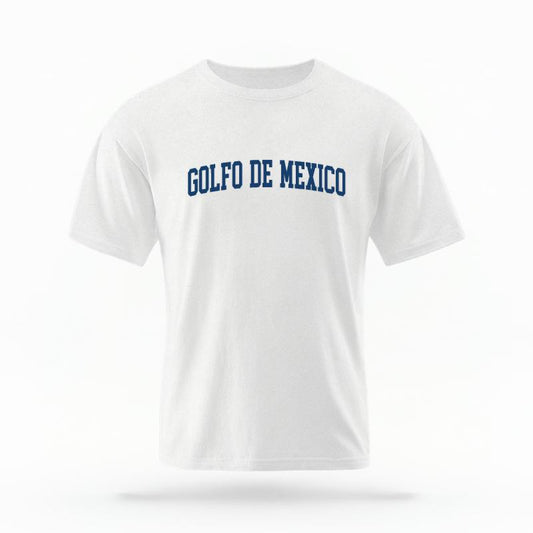 The White Unisex Golfo De Mexico Varsity T-shirt is set against a Ghost - White Studio background.  The Golfo De Mexico Varsity graphic is in a Varsity style. 