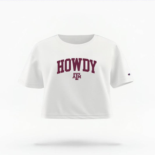 The White Female Howdy Varsity Women's Boxy Crop Top is set against a Ghost - White Studio background.  The Howdy Varsity graphic is in a Sports Graphics style. 