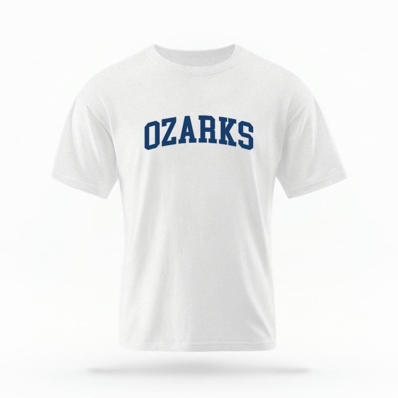 The White Unisex Ozarks AR Varsity T-shirt is set against a Ghost - White Studio background.  The Ozarks AR Varsity graphic is in a Varsity style. 