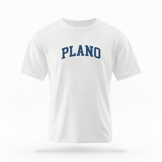 The White Unisex Plano Texas Varsity T-shirt is set against a Ghost - White Studio background.  The Plano Texas Varsity graphic is in a Varsity style. 