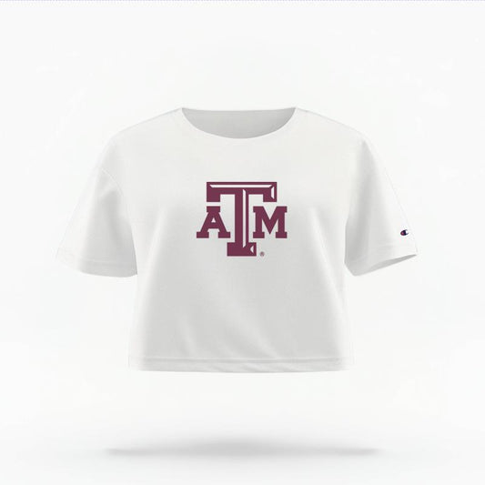 The White Female Texas A&M Logo Women's Boxy Crop Top is set against a Ghost - White Studio background.  The Texas A&M Logo graphic is in a Logo style. 