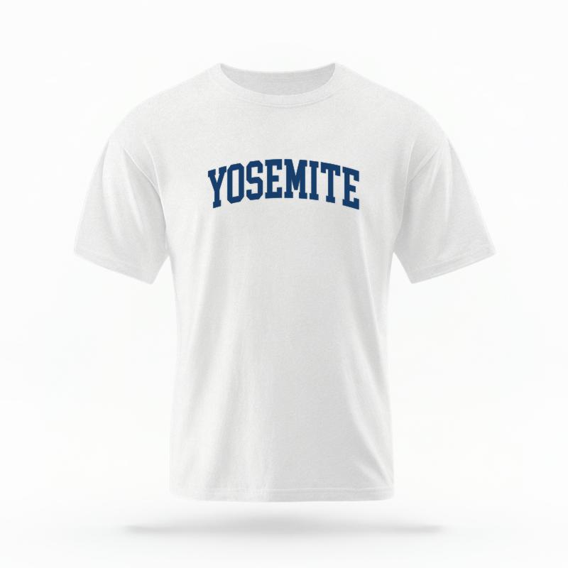 The White Unisex Yosemite CA Varsity T-shirt is set against a Ghost - White Studio background.  The Yosemite CA Varsity graphic is in a Varsity style. 